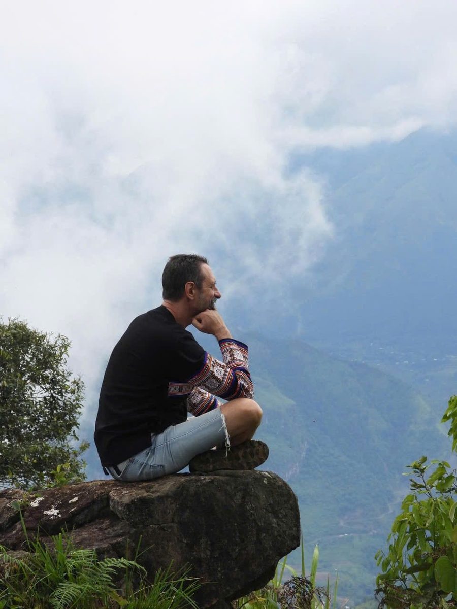 AllVlad, sitting on a rock above the mountains and rice terraces of northern Vietnam
